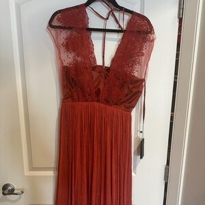 Rust coloured pleated lace overlay cocktail dress